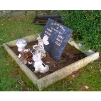 Dark gray granite supported tablet engraved with pet names