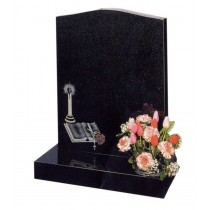 RL199 - Black granite with an o-gee top contrasts the book and candle design. Lawn Memorial, Headstone
