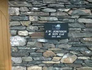 Black granite tablet all honed to look like blue slate, with etched design and hidden fixings