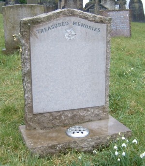 PJ22 - UK sourced limestone showing a hand carved design with lead filled hand carved letters.  Bespoke Headstones, Lawn Memorials